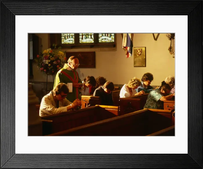 Framed Print : Vicar in church with people praying in Hungerford August 1987 Framed Print : Vicar in church with people praying in Hungerford August 1987