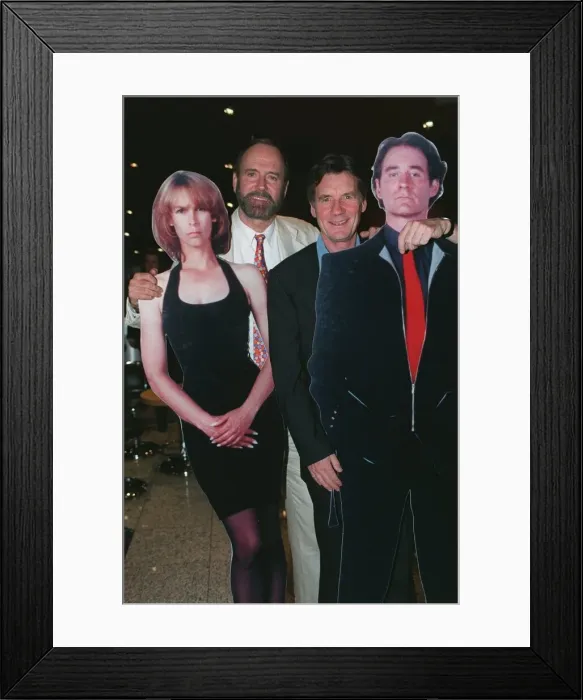 Framed Print : John Cleese and Michael Palin with cardboard cut-outs of Jamie Lee-Curtis Framed Print : John Cleese and Michael Palin with cardboard cut-outs of Jamie Lee-Curtis