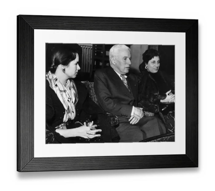 Framed Print : Charlie Chaplin with wife Una & Anna Magnani 1952 at a private showing in London Framed Print : Charlie Chaplin with wife Una & Anna Magnani 1952 at a private showing in London