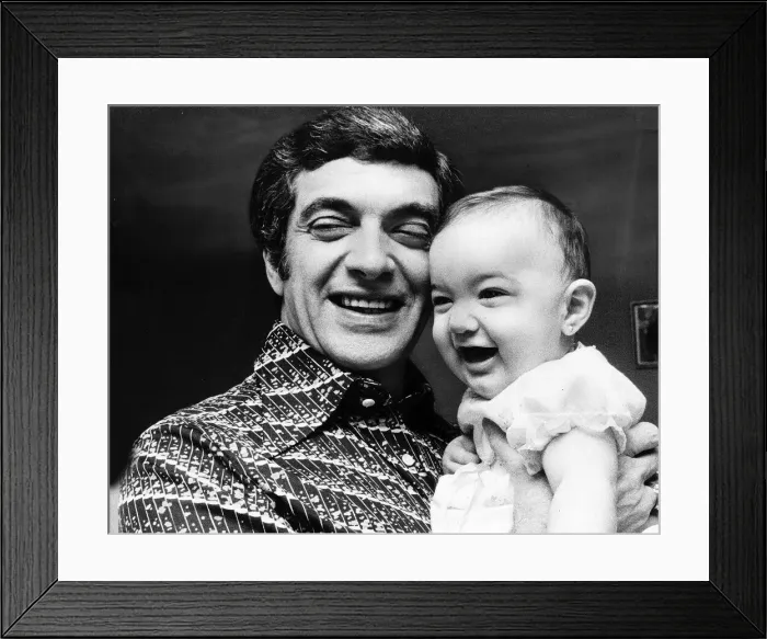 Framed Print : Frankie Vaughan with his grandaughter Natalie Lisa 1976 Framed Print : Frankie Vaughan with his grandaughter Natalie Lisa 1976