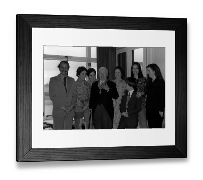 Framed Print : Charlie Chaplin with family receiving Knighthood 1975 with wife Una Framed Print : Charlie Chaplin with family receiving Knighthood 1975 with wife Una