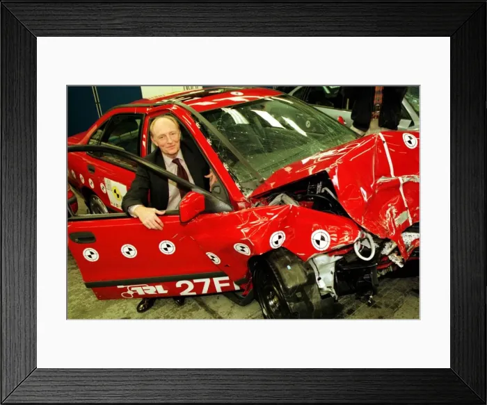 Framed Print : Neil Kinnock EU Commissoner for transport with crashed Volvo at todays EURO NCAP test Framed Print : Neil Kinnock EU Commissoner for transport with crashed Volvo at todays EURO NCAP test