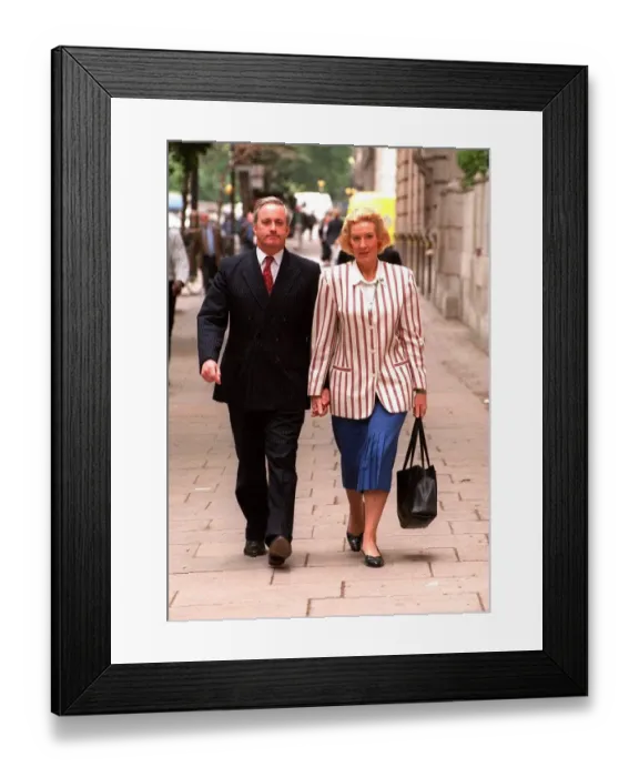 Framed Print : Neil Hamilton former MP for Tatton with his wife Christine near Millbank Westminster Framed Print : Neil Hamilton former MP for Tatton with his wife Christine near Millbank Westminster