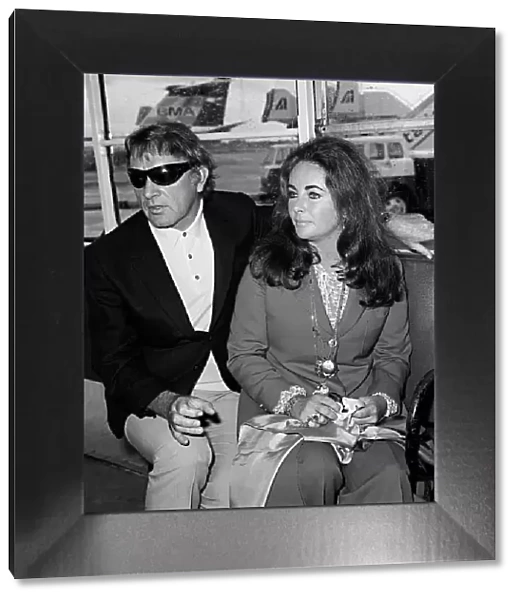 Elizabeth Taylor with Richard Burton at London airport 1970