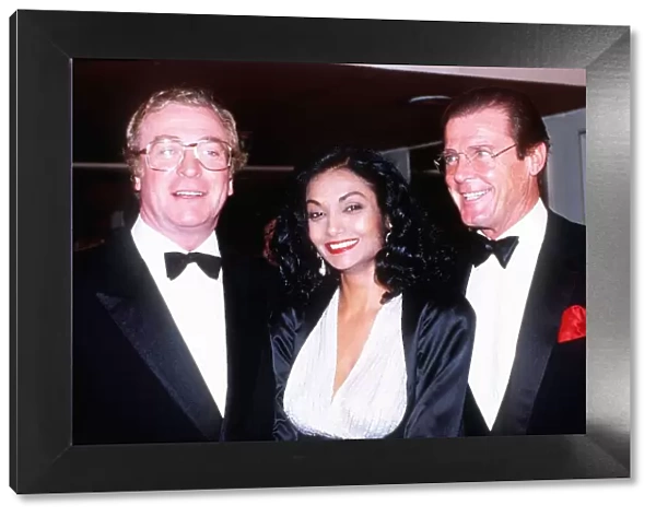 Michael Caine with wife Shakira and Roger Moore at the Barnardos ball at the Grosvenor