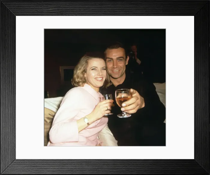 Framed Print : Sean Connery and Honor Blackman enjoy a drink Framed Print : Sean Connery and Honor Blackman enjoy a drink