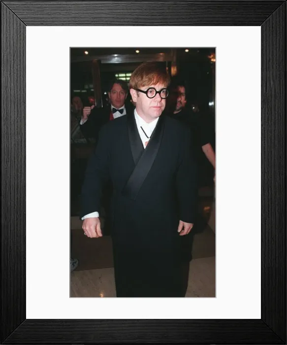 Framed Print : Sir Elton John arrives at Noel Coward AIDS Gala Dinner 1998 at the Park Lane Hotel Framed Print : Sir Elton John arrives at Noel Coward AIDS Gala Dinner 1998 at the Park Lane Hotel