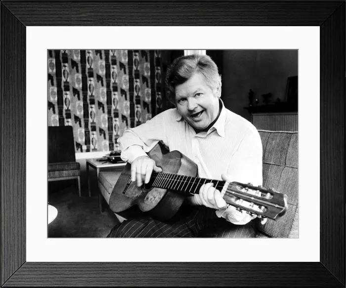 Framed Print : Benny Hill at home playing his guitar 1979 Framed Print : Benny Hill at home playing his guitar 1979