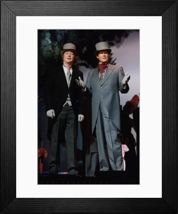 Framed Print : Roger Moore and Michael Caine actors during a Palladium Gala rehearsal