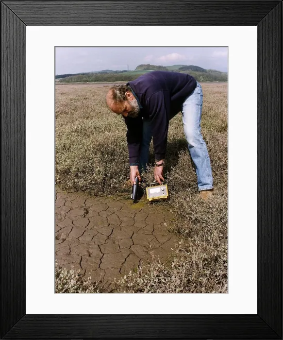 Framed Print : Atoms Geiger Counter measuring radioactivity in soil around Sellafield Framed Print : Atoms Geiger Counter measuring radioactivity in soil around Sellafield