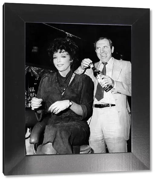 Leonard Rossiter actor with Joan Collins in Cinzano advert