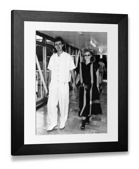 Framed Print : Culture Club lead guitarist Roy Hay leaves Heathrow with his wife Allison Hay