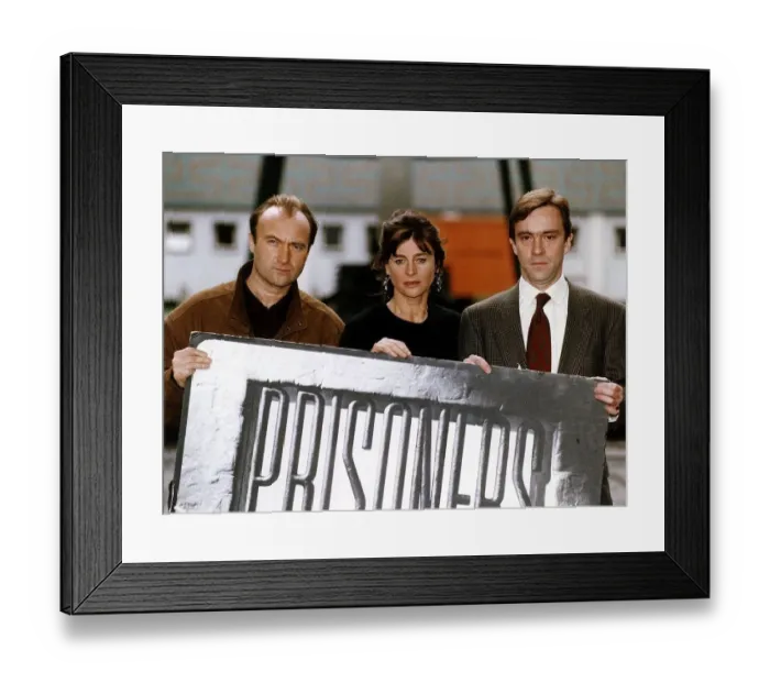 Framed Print : John McCarthy former hostage with Phil Collins and Julie Christie at launch of new tv