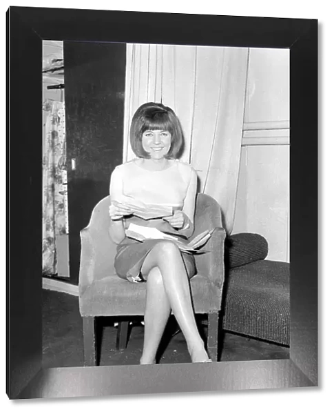 Cilla Black seen here reading her birthday telegraphs in her dressing room at the London
