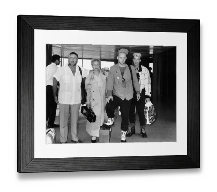 Framed Print : Boy George Pop Singer of Culture Club flies back into the UK from a holiday in Barbados Framed Print : Boy George Pop Singer of Culture Club flies back into the UK from a holiday in Barbados