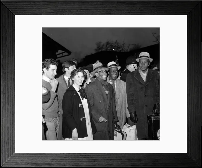 Framed Print : Jazz legend George Lewis arrives at Euston station, London Framed Print : Jazz legend George Lewis arrives at Euston station, London
