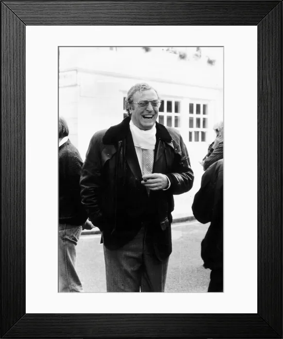 Framed Print : Michael Caine laughed at one of Roger Moores corny card tricks whilst filming Bullseye in Framed Print : Michael Caine laughed at one of Roger Moores corny card tricks whilst filming Bullseye in