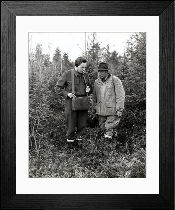 Framed Print : Peter Harris and Michael Harlow - October 1947 use a Geiger counter to track down Framed Print : Peter Harris and Michael Harlow - October 1947 use a Geiger counter to track down