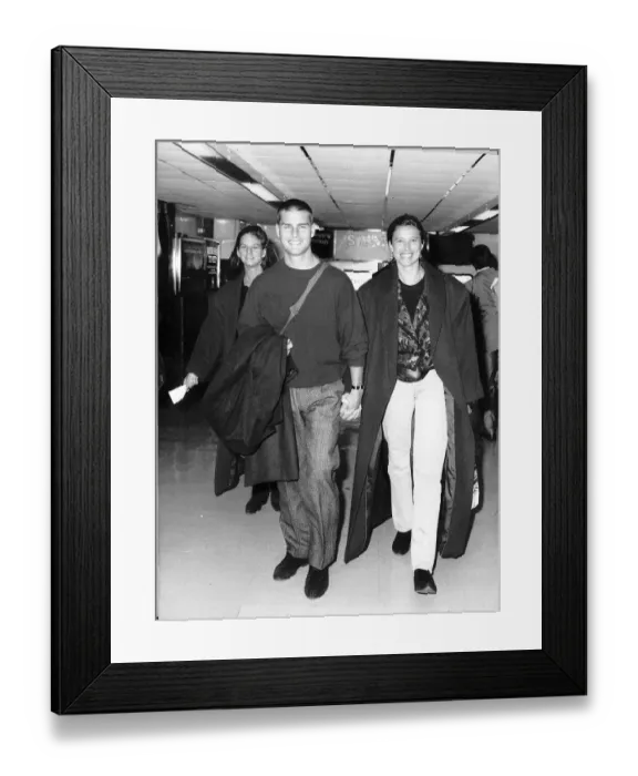 Framed Print : Tom Cruise actor seen with his wife at London Airport Framed Print : Tom Cruise actor seen with his wife at London Airport
