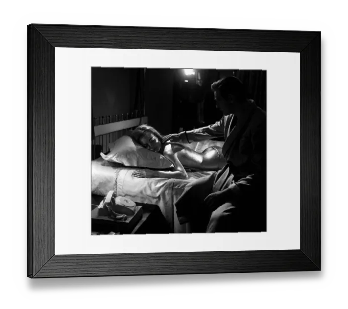 Framed Print : Sean Connery on set at Pinewood studios making the film Goldfinger with Sherley Eaton who