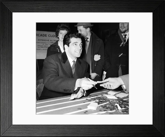 Framed Print : Frankie Vaughan March 1962 with some of the coins collected for the silver charity run