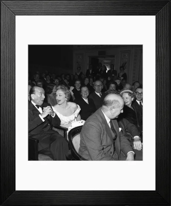 Framed Print : Marlene Dietrich sitting in the stalls of the Globe Theatre with Noel Coward whose play Framed Print : Marlene Dietrich sitting in the stalls of the Globe Theatre with Noel Coward whose play
