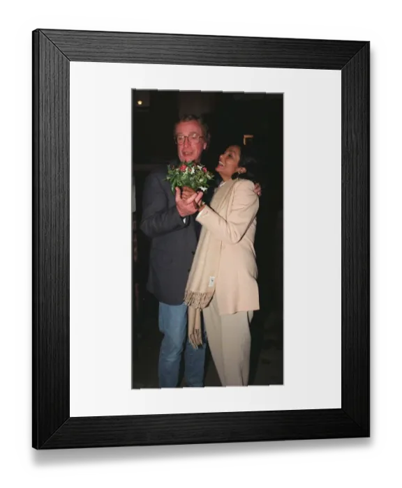 Framed Print : Michael Caine and wife arrive for film producer Michael Winners birthday party