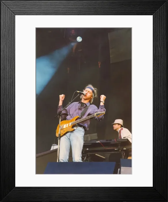 Framed Print : Dire Straits frontman Mark Knopfler performs with the group at Gateshead Framed Print : Dire Straits frontman Mark Knopfler performs with the group at Gateshead