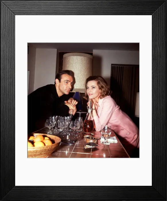 Framed Print : Films Gold Finger 1964 Sean Connery as James Bond leans on breakfast counter with Honor Framed Print : Films Gold Finger 1964 Sean Connery as James Bond leans on breakfast counter with Honor