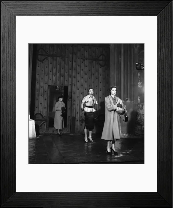 Framed Print : Joan Collins being released from Holloway prison in a scene from the film Turn the Key Framed Print : Joan Collins being released from Holloway prison in a scene from the film Turn the Key