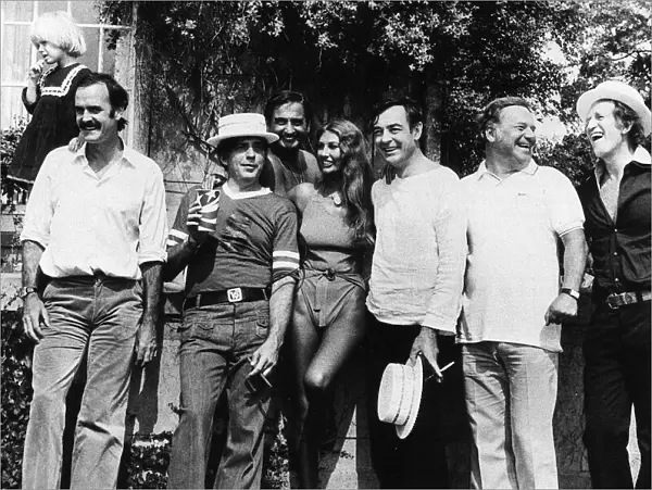 Marilyn Cole former Playmate of the Year with (left to right) John Cleese, Victor Lownes