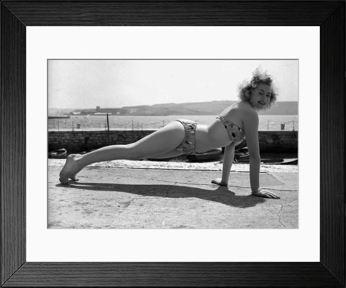 Framed Print : Joan Baxter 1957 showgirl doing keep fit press up on Plymouth harbour Framed Print : Joan Baxter 1957 showgirl doing keep fit press up on Plymouth harbour