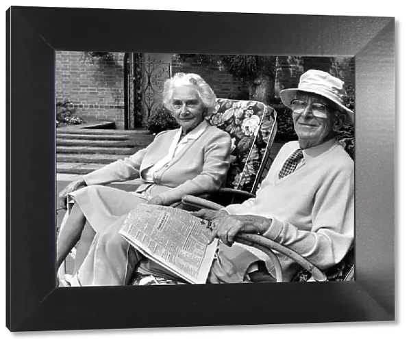 Sir William Lyons and Lady Lyons pictured in their garden at Wappenbury Hall