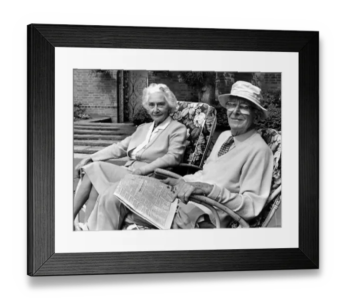 Framed Print : Sir William Lyons and Lady Lyons pictured in their garden at Wappenbury Hall