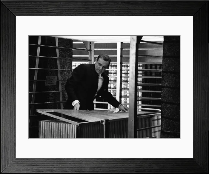 Framed Print : Film Goldfinger 1964 Sean Connery as James Bond 007 hand cuffed to a nuclear bomb in Framed Print : Film Goldfinger 1964 Sean Connery as James Bond 007 hand cuffed to a nuclear bomb in