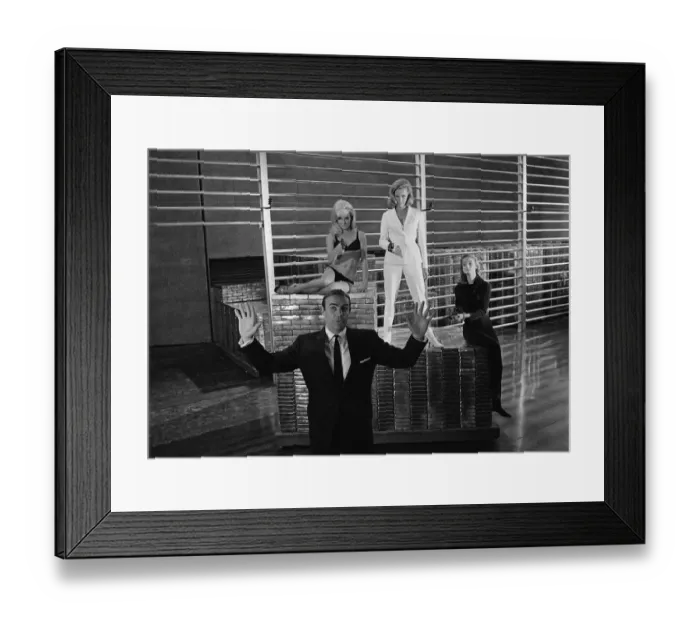 Framed Print : Film Goldfinger 1964 Sean Connery as James Bond 007 poses with Bond girls Honor Blackman Framed Print : Film Goldfinger 1964 Sean Connery as James Bond 007 poses with Bond girls Honor Blackman