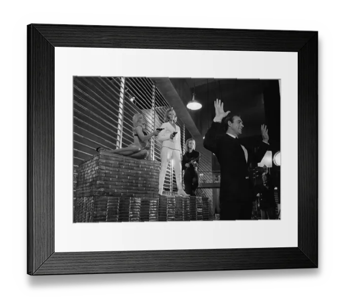 Framed Print : Film Goldfinger 1964 Sean Connery as James Bond 007 poses with Bond girls Honor Blackman Framed Print : Film Goldfinger 1964 Sean Connery as James Bond 007 poses with Bond girls Honor Blackman
