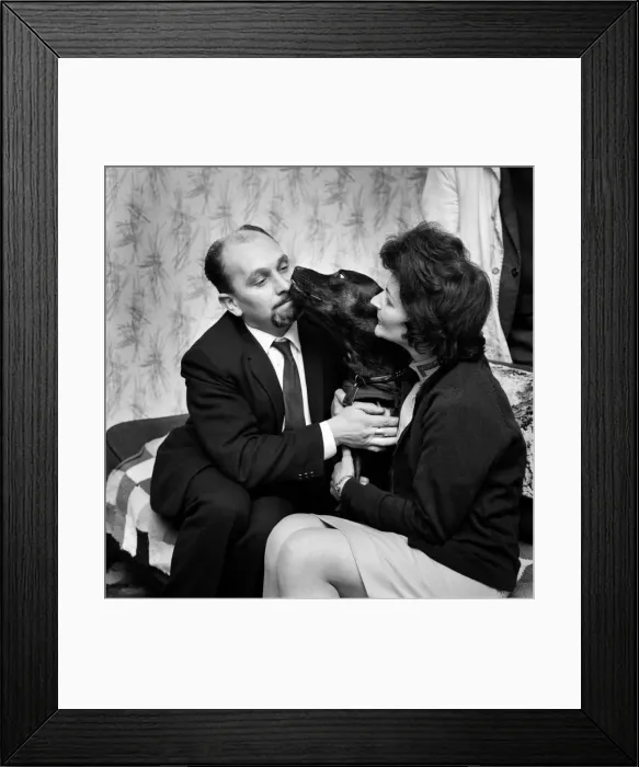 Framed Print : Humour people with animals family group in their home with their pet dog