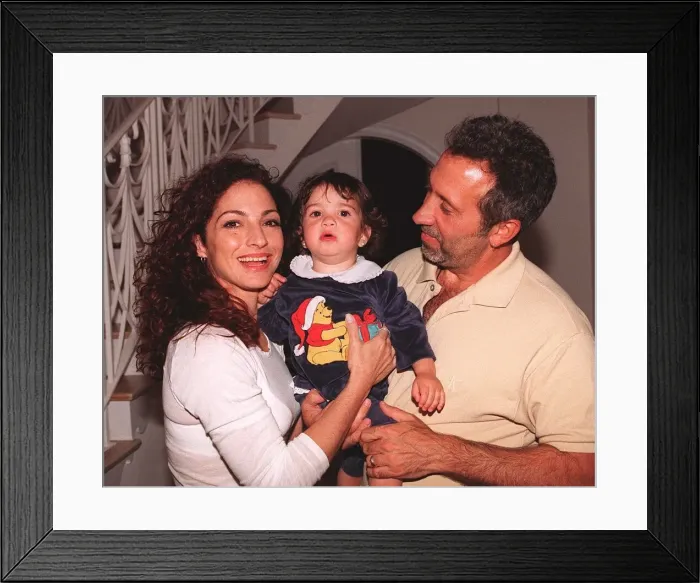 Framed Print : Gloria Estefan with husband Emilio and daughter Emily 14 months at home on Star Framed Print : Gloria Estefan with husband Emilio and daughter Emily 14 months at home on Star