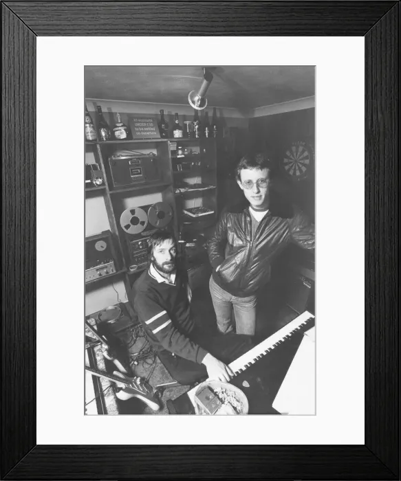 Framed Print : Alan Hull (seated) and Ray Laidlaw of the pop group Lindisfarne. 25 / 11 / 80 Framed Print : Alan Hull (seated) and Ray Laidlaw of the pop group Lindisfarne. 25 / 11 / 80