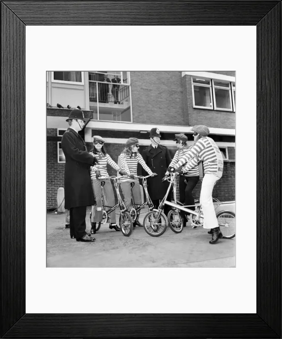 Framed Print : It looks as though the Police had caught up with four pretty robbers Framed Print : It looks as though the Police had caught up with four pretty robbers