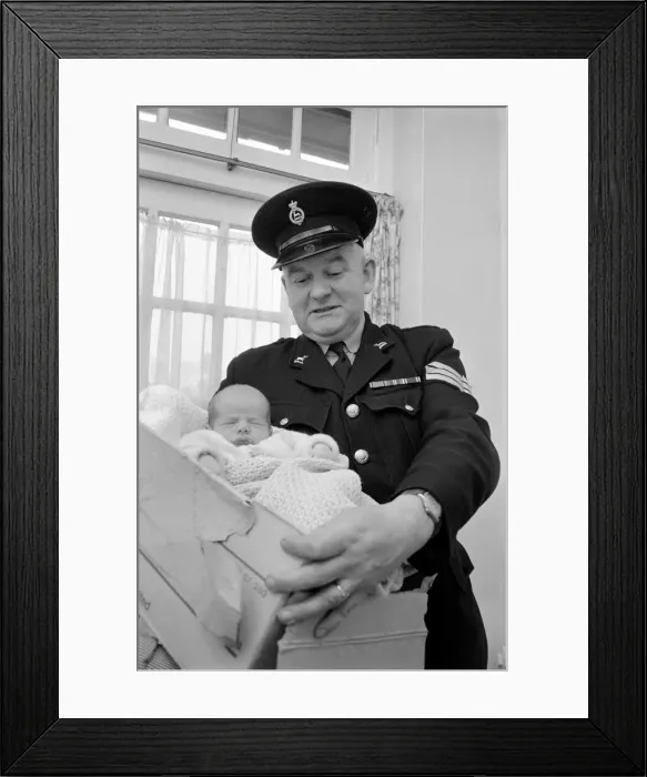 Framed Print : A policeman with a new born baby. December 1969 Z11742