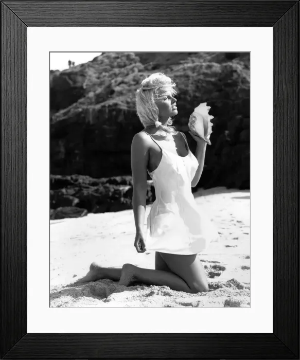 Framed Print : Fashion Underwear: be hip in a slip. On beach on sand with sea shell