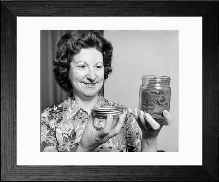 Framed Print : Alice Bough keeps her precious war-time stockings in an airtight jar