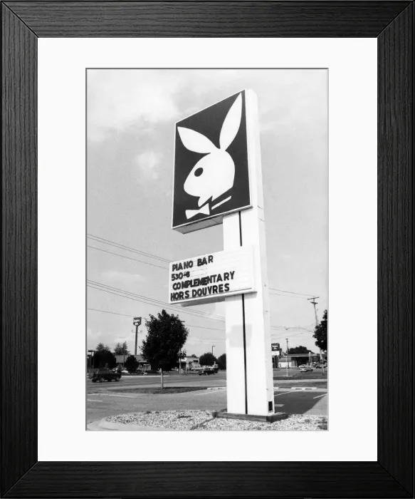 Framed Print : Sign outisde a Bunny Club. July 1988 P018476 Framed Print : Sign outisde a Bunny Club. July 1988 P018476