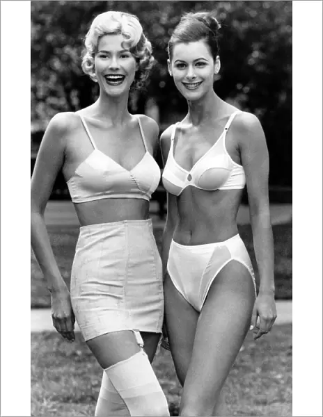 Clothing - Underwear. Two models wearing lingerie outdoors - bra, knickers, stockings
