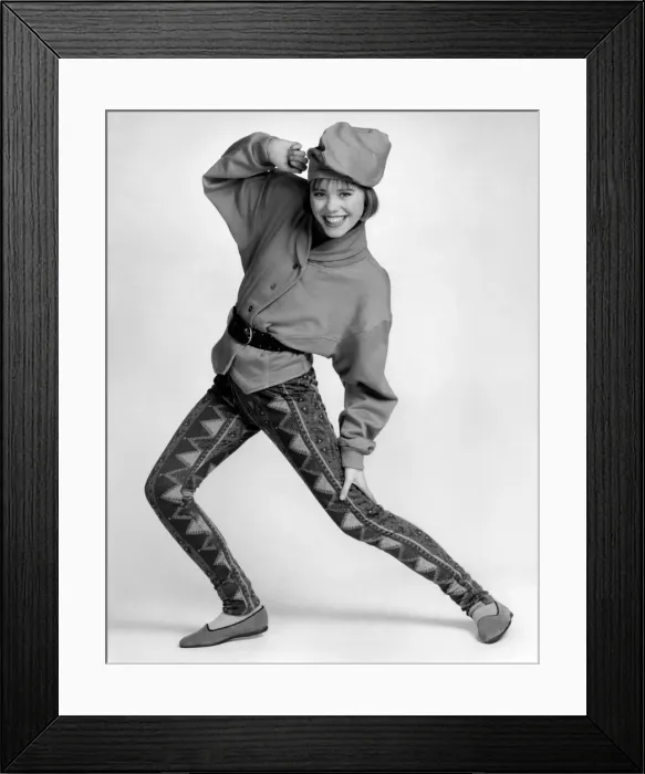 Framed Print : Printed leggings, polo ribbed top, turquoise jacket orange socks complete with purple Framed Print : Printed leggings, polo ribbed top, turquoise jacket orange socks complete with purple