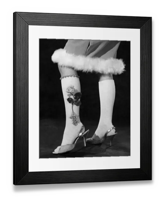 Framed Print : Clothing stockings. Fur-trimmed skirt, knee length socks with a rose flower design