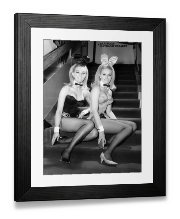 Framed Print : Bunny girls sitting on the steps inside the nightclub where they work Framed Print : Bunny girls sitting on the steps inside the nightclub where they work