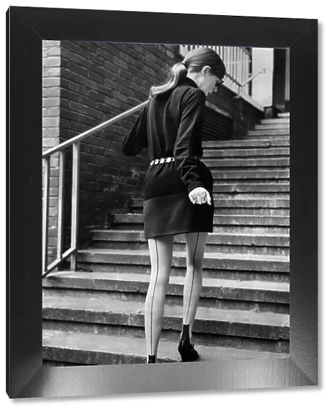 Clothing - Stockings Seamed stockings feature. Model walks up steps